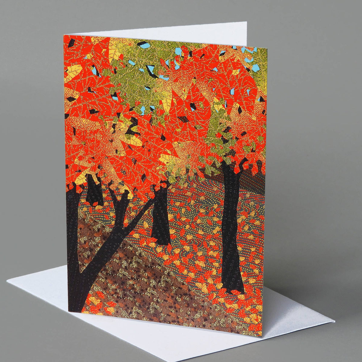 Autumn Road notecard of bright orange trees with black trunks over a hillside path covered in fallen leaves
