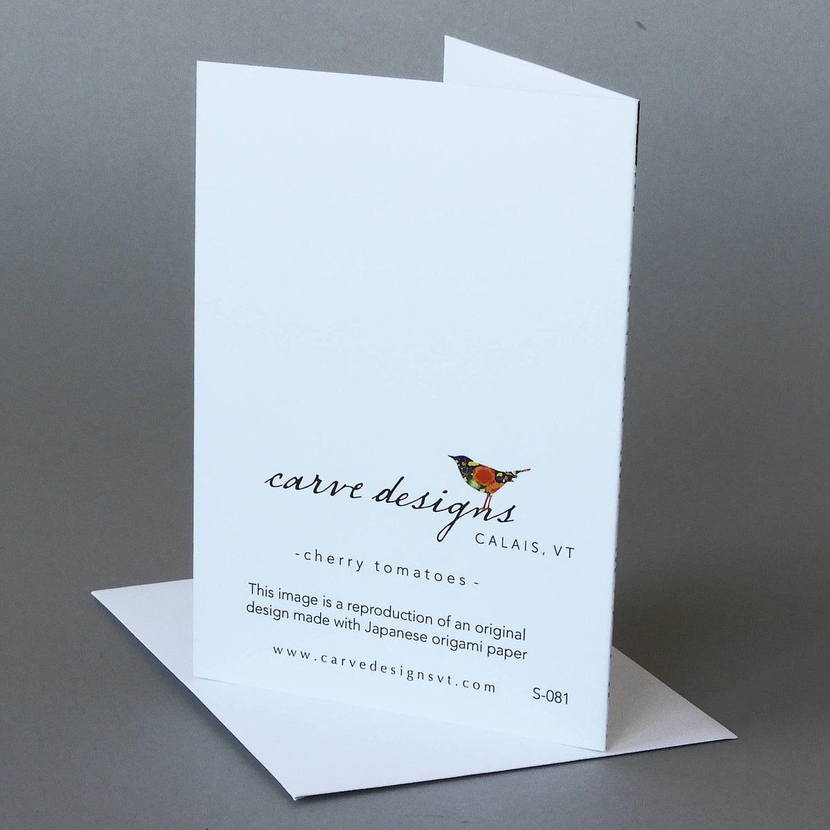 Back of the Cherry Tomatoes notecard with the Carve Designs bird logo, Calais VT, and origami paper reproduction note