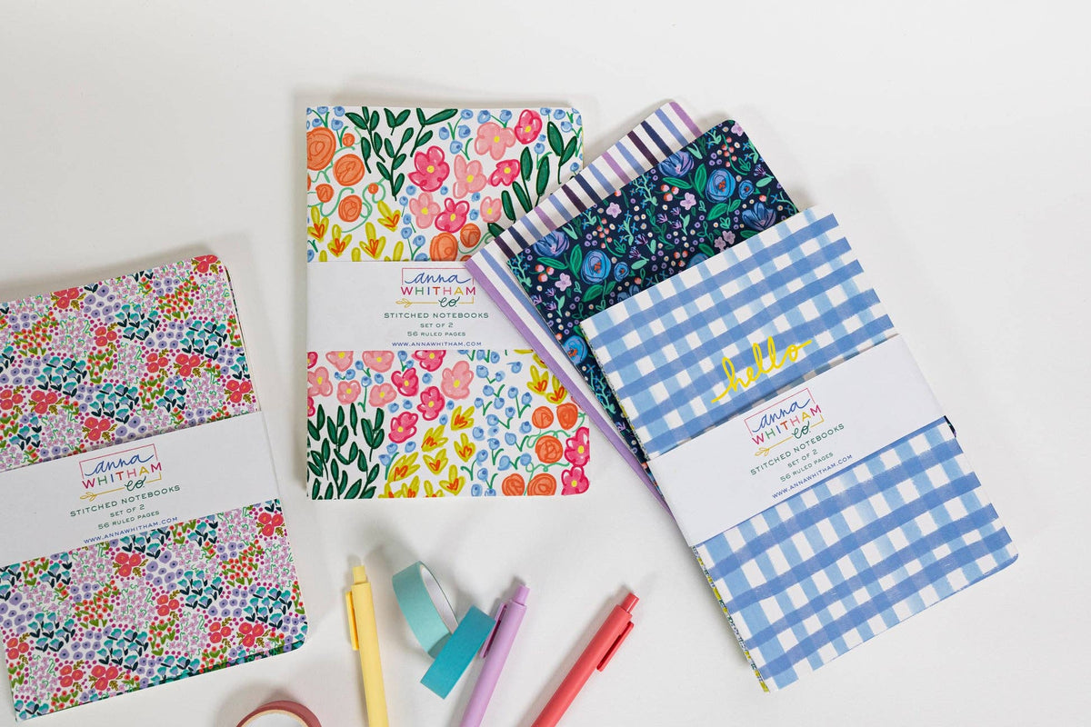 Alison Floral Notebook Set displayed among other Anna Whitham Co. stitched notebook sets in colorful floral, striped, navy floral, and blue gingham patterns
