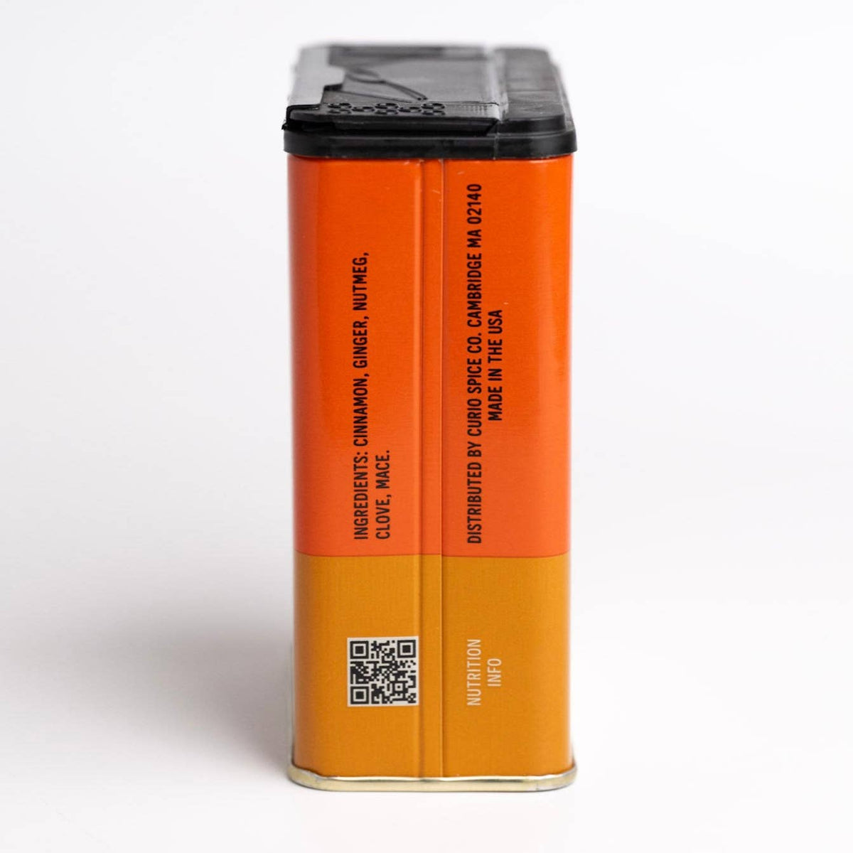 Side of the Pumpkin Spice tin listing ingredients: cinnamon, ginger, nutmeg, clove and mace, with a QR code