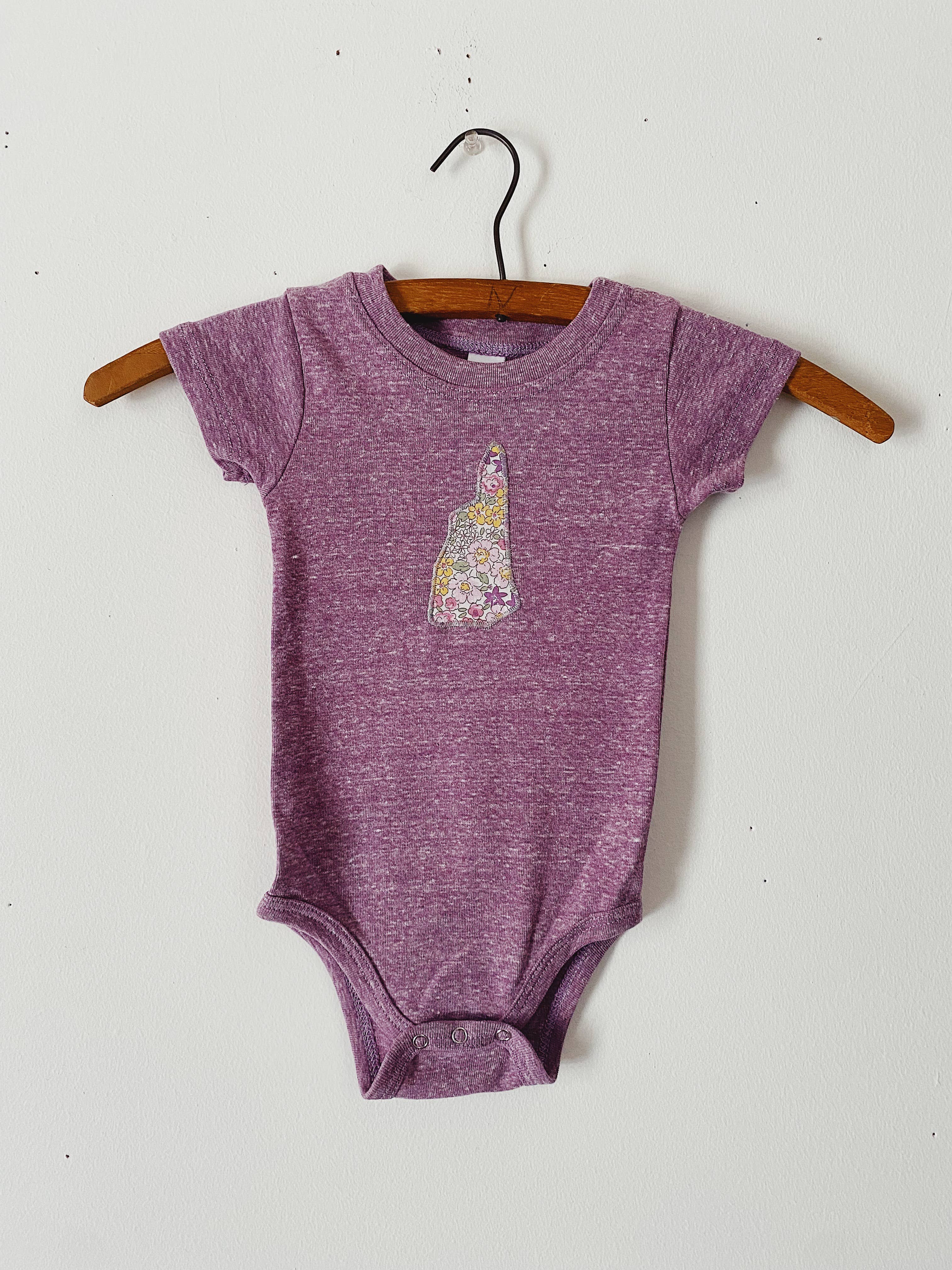 New Hampshire Baby Bodysuit — Purple Floral