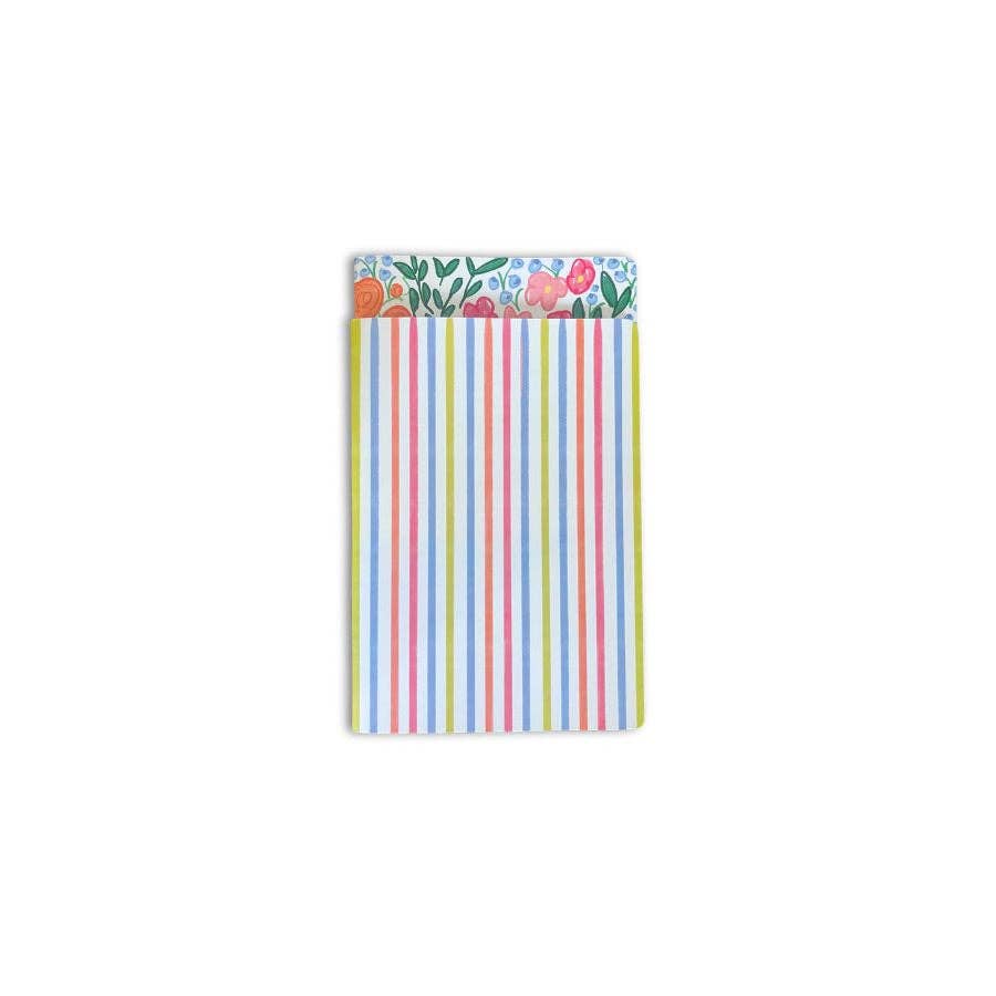 Coordinating multicolor striped notebook from the Lauren Floral Notebook Set, tucked behind the floral cover