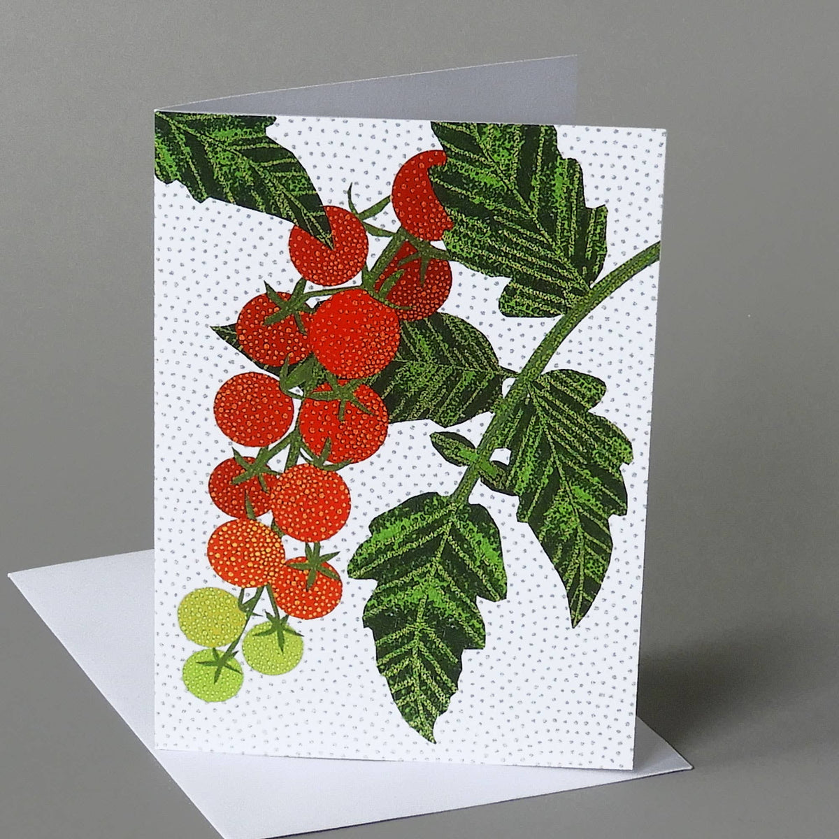 Cherry Tomatoes notecard of red and green cherry tomatoes on a leafy vine against a white dotted background