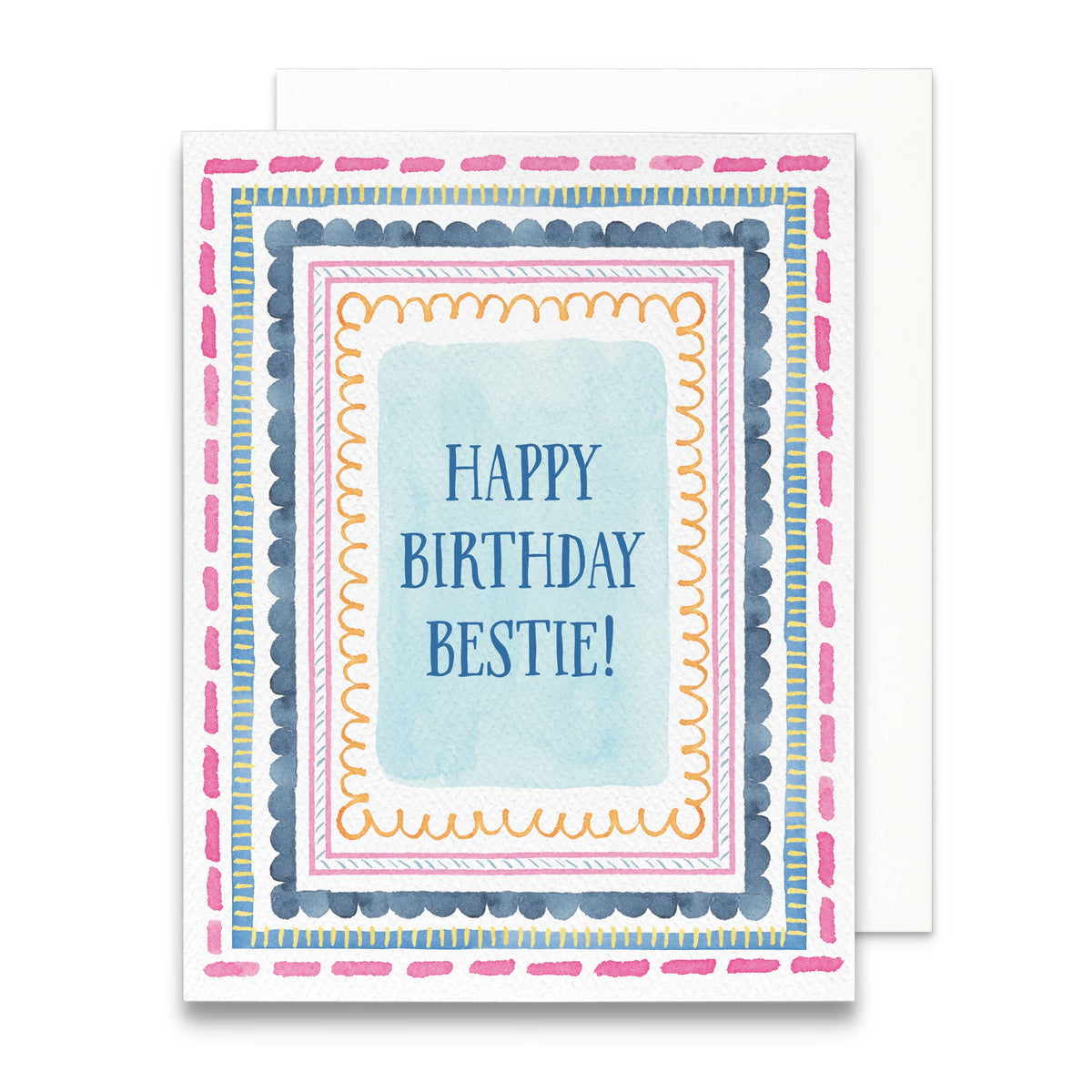 Happy Birthday Bestie card in blue lettering framed by pink, navy, orange and yellow watercolor borders, on an envelope