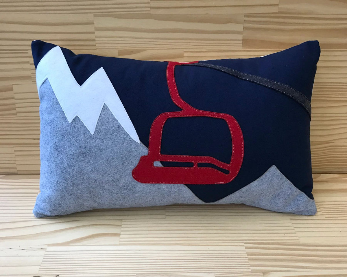 Red Chairlift on Mountains Lumbar Pillow — Navy