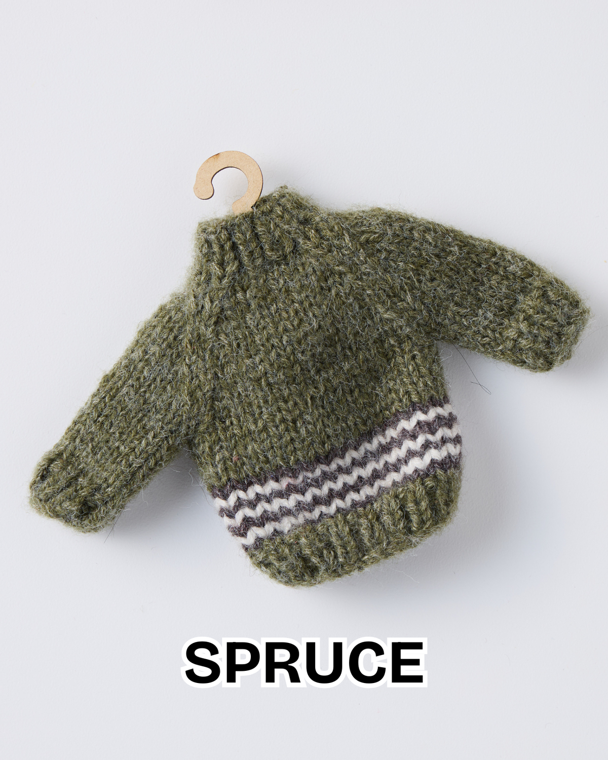 Spruce green mini knit sweater ornament with a striped hem on a wooden hanger